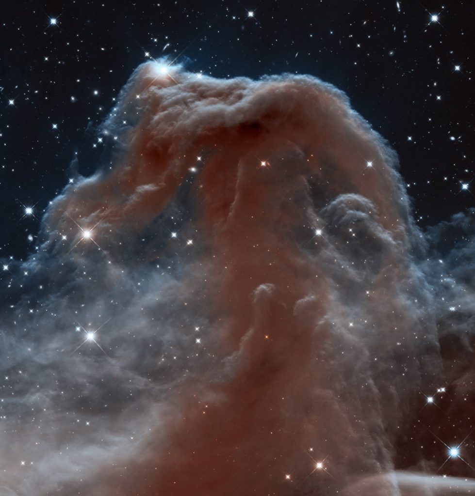 នេះជារូបភាពនេប៊ូឡា Horsehead  ដែលប្រែជាខ្មែរថា «ក្បាលសេះ» ថតដោយ Hubble